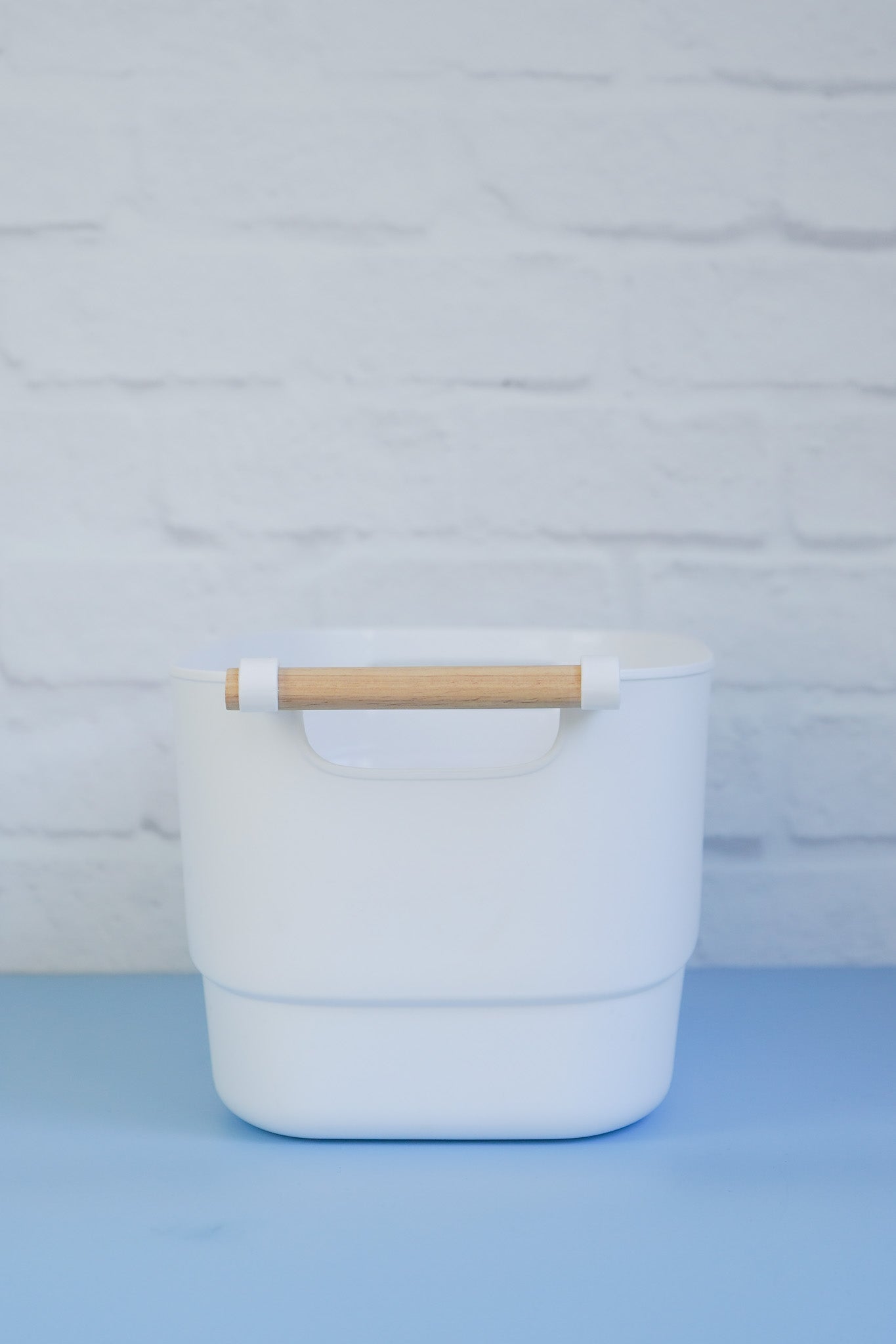 The white tub with wooden handle from The Little Pantry Project.